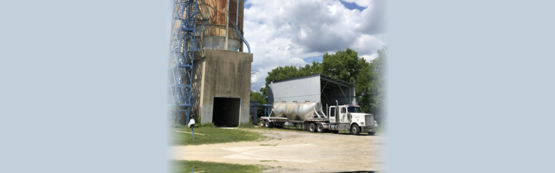 Truck parked outside a huge building